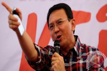 Ahok Tersangka Hormati Proses Hukum