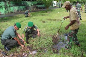Kodim 1709/Yawa galang aksi penanaman pohon pinang  
