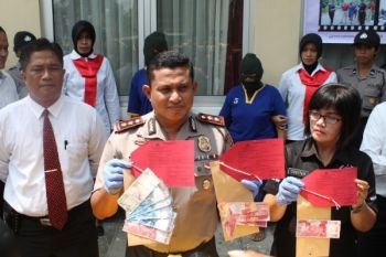 Pengedar Uang Palsu Incar Pedagang Tua