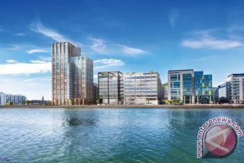 Kennedy Wilson announces sale of 130,000 sq ft office building to J.P. Morgan as first occupier at its capital dock development