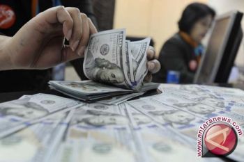 Dolar AS turun tipis