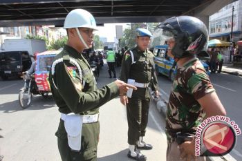 Pakai Atribut TNI, Empat Warga Ditegur Denpom