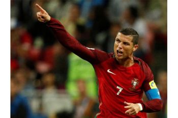 Ronaldo dan Messi melaju ke piala dunia