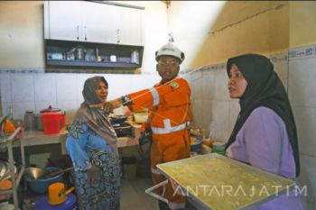 Belajar Menggerakkan Ekonomi Warga Dari "Kampung "Kue"