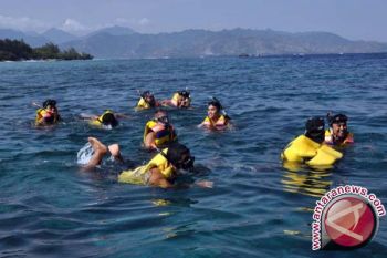 Polisi-Pamswakarsa Jaga Ketertiban Kawasan Gili Trawangan 