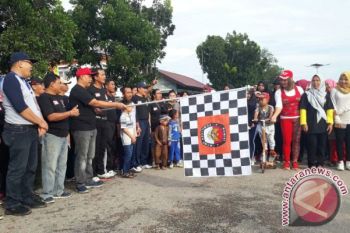 KPU Lamandau Manfaatkan Jalan Sehat Kampanyekan Pilkada 2018