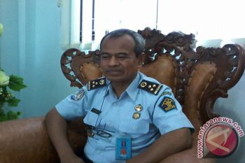 Imigrasi Palu Beri Paspor Gratis Empat Orang