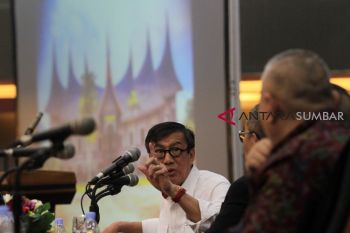 MENKUMHAM SIMPOSIUM NASIONAL