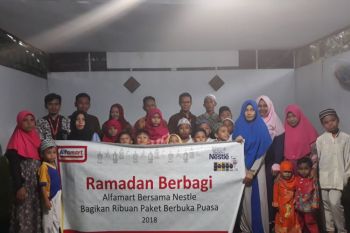 Alfamart berbagi dengan anak yatim dan dhuafa di Sulut