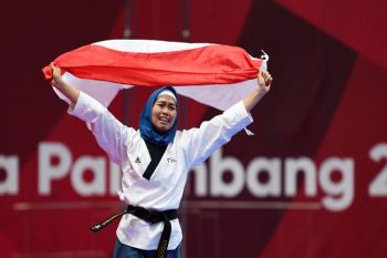 Emas Defia Rosmaniar satu-satunya medali untuk Indonesia cabang Taekwondo