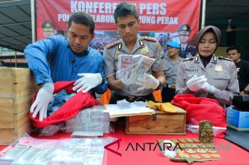 KASUS UANG PALSU DOLAR AS