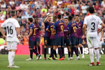 Barca gulung Huesca 8-2