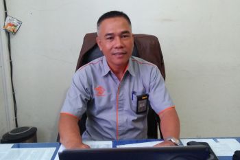 Permudah masyarakat, Pos Pariaman kerja sama dengan polisi distribusikan TNKB