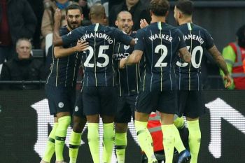 Manchester City melaju di hasil dan klasemen Grup F