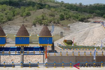 Newly completed dam being filled with water