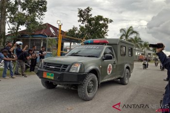 Eight bodies of slain workers moved to Timika