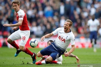 Kane bawa timnya bermain imbang lawan Arsenal