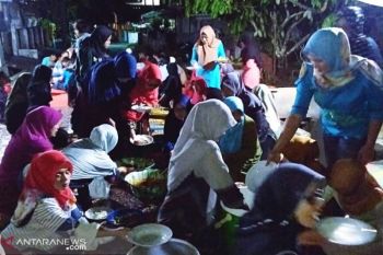 Residents of the Housing of Talago Agam welcome Ramadhan (The Islamic Month of Fasting) with eating together