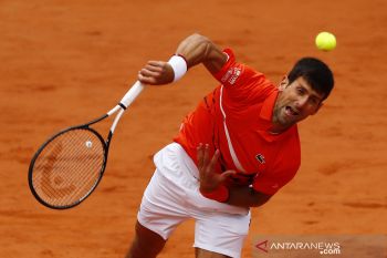 Tidak ada lapangan rumput di Serbia? Tak masalah bagi Djokovic