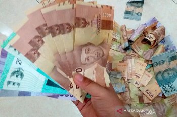 Nilai tukar rupiah menguat 14 poin, Senin pagi