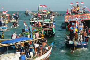 Tradisi pesta lomban