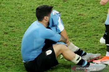 Suarez sembunyikan tangis usai Uruguay tersingkir