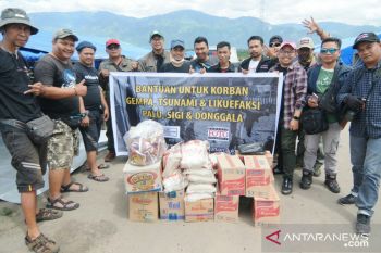 Pewarta Foto Palu salurkan bantuan untuk korban bencana Sulteng