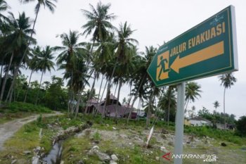 Rambu penunjuk arah evakuasi