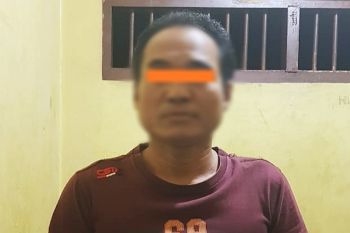 Petani ini ditangkap polisi karena todongkan pistol