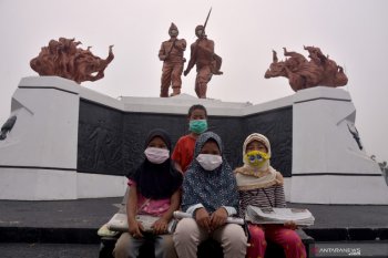 Kabut asap merampas hak anak