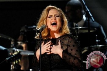 Terinspirasi dari perceraian, Adele kembali bermusik dengan lagu bernuansa ceria