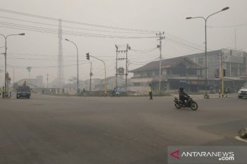 Warga di Pontianak mulai keluhkan sesak napas dan sakit kepala akibat kabut asap