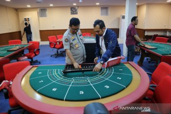 Satu tewas saat polisi gerebek kasino di Apartemen Robinson