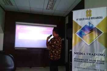 PT Solid Gold Berjangka  cetak rapor biru
