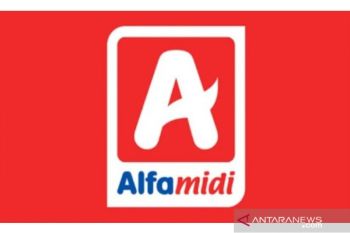 Alfamidi membagikan bantuan gerobak untuk berjualan pelaku UMKM