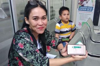 Warga Muara Teweh  ini  rasakan banyak manfaat gunakan Mobile JKN