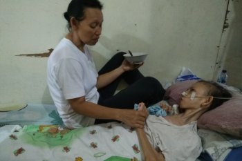 Ibu bocah mengalami pengeriputan otak kesulitan bayar listrik