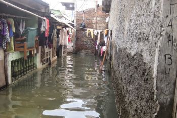 Permukiman penduduk di Baturaja  dilanda banjir akibat hujan deras