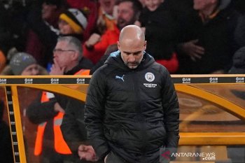 Pep Guardiola mengaku peluang juara Manchester City sudah raib