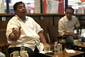 BI tegaskan QRIS tak akan hentikan  peredaran uang