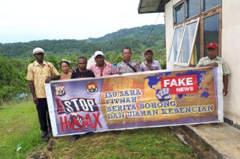 Polsek Depapre sosialisasi anti hoax dan PON XX
