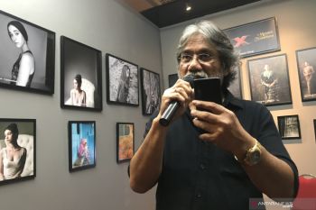 Tips foto dari kamera ponsel ala Darwis Triadi