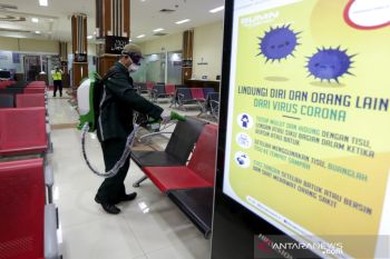 Penyemprotan disinfektan di Bandara SIM