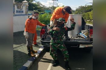 Kodim Muara Teweh dan gugus tugas  gencar lakukan desinfektan