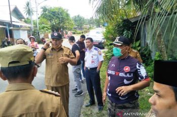 Masuk Pariaman, diukur suhu badan