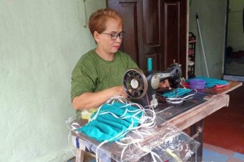 Masker kain kurang efektif cegah penularan COVID-19, kata dokter