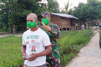 Kodim 1711 Boven Digoel bagikan masker gratis cegah penyebaran virus corona