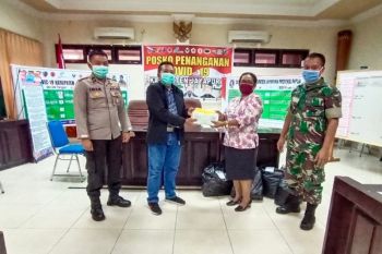 Pemkab Jayapura bagikan 7.050 masker gratis untuk cegah pandemi COVID-19