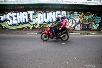 Sosialisasi COVID-19 melalui mural