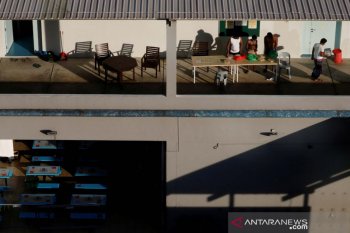 Warga Singapura masak biryani saat  Idul Fitri untuk  migran karantina